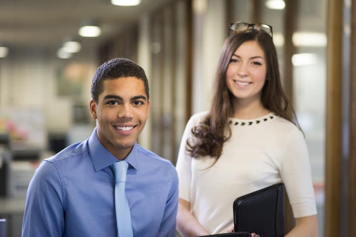 Goodwill AZ | A man and women smiling in a office