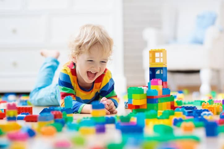 Goodwill AZ | Little kid playing with blocks