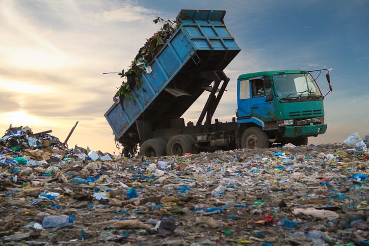 Goodwill AZ | Dump truck in landfill