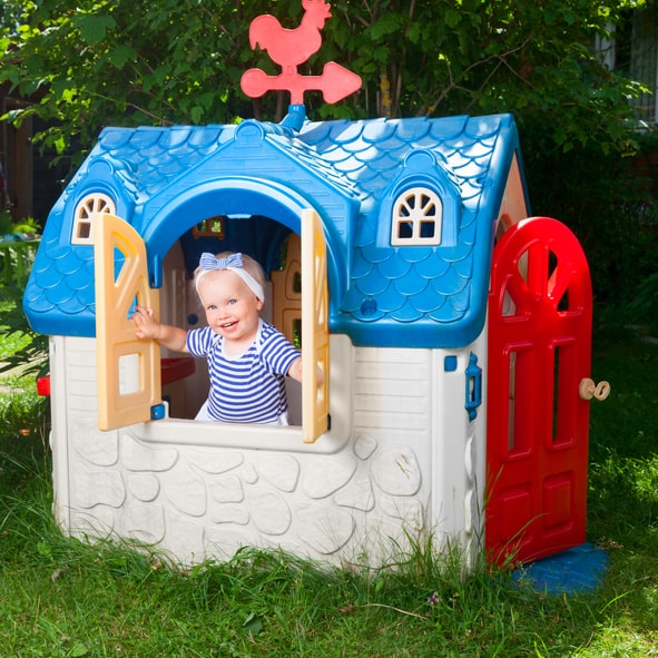 Goodwill AZ | Baby in a children's playhouse