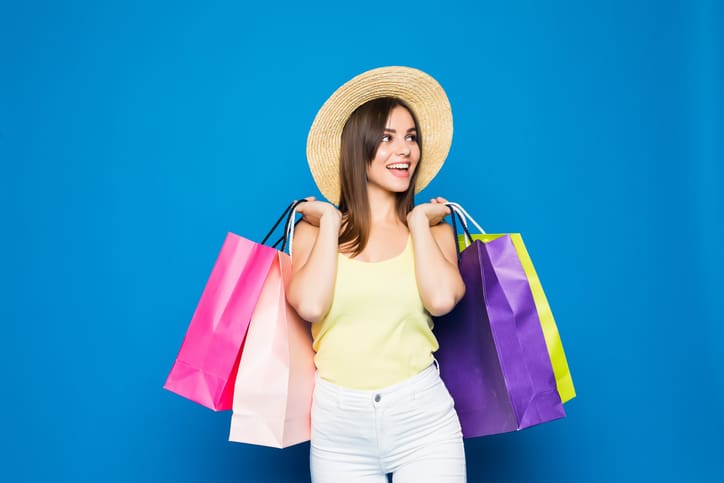 Goodwill AZ | woman posing with shopping bags