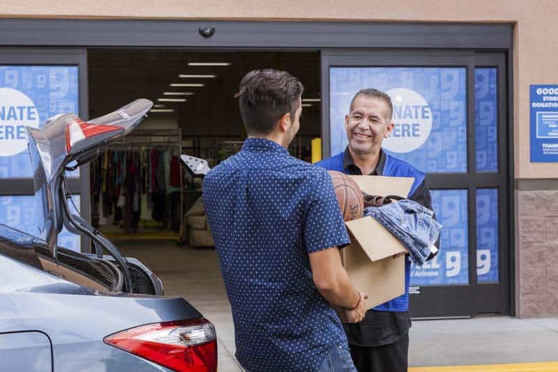 Goodwill Az | Man making a donation