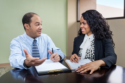 Goodwill AZ | Man and women having a meeting