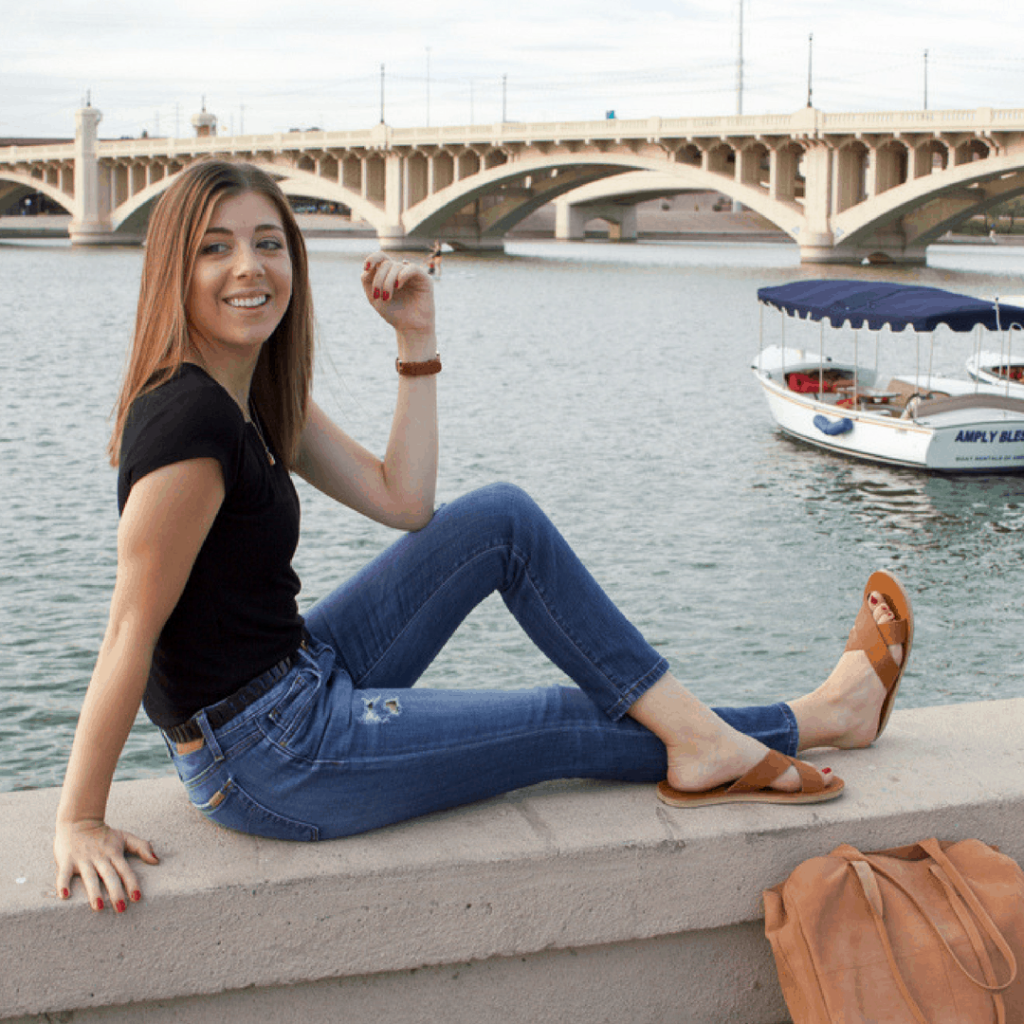 Goodwill AZ | women sitting by a boat on water