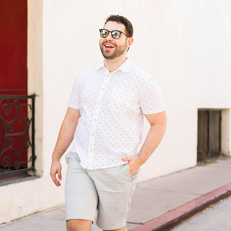 Goodwill AZ | Man in white shirt smiling outside