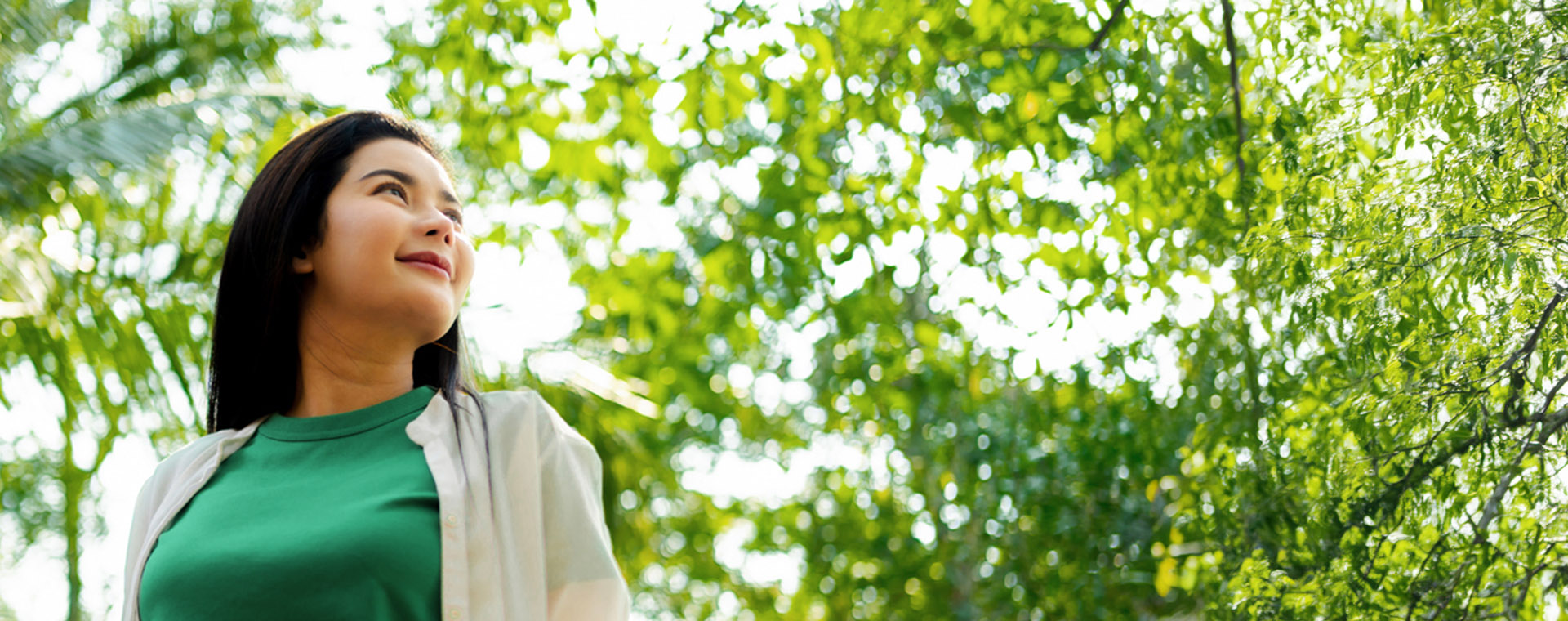 image of woman wearing green outdoors